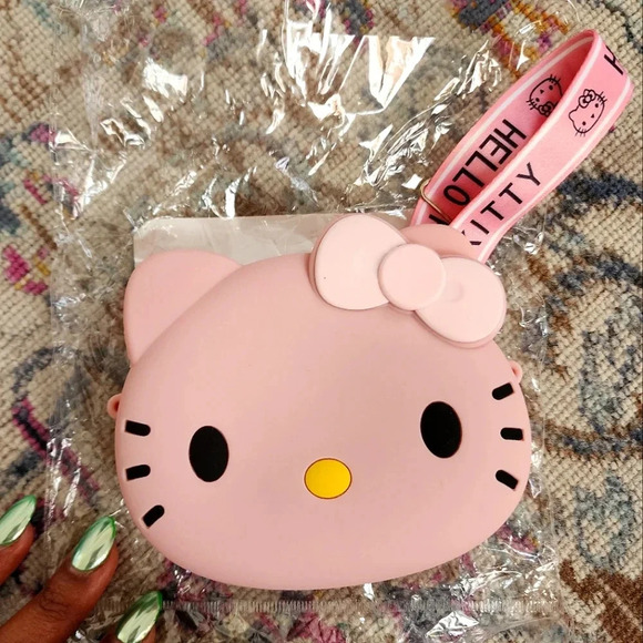 NWT, Hello Kitty Pink Yellow Bow Coin Purse Shoulder Strap Hand Size Rubber. - Picture 1 of 4